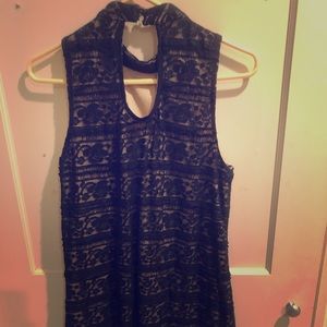 Medium, simple black dress.